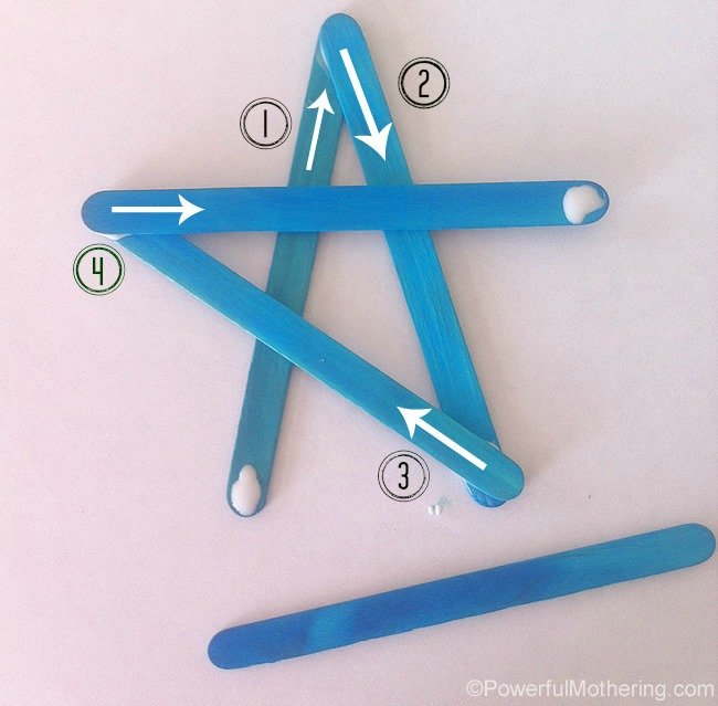 glueing the craft sticks