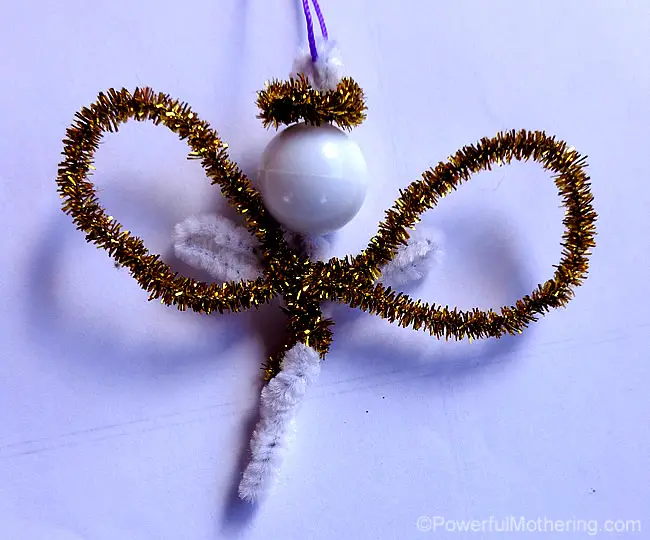 attach wings to angels body and add halo 