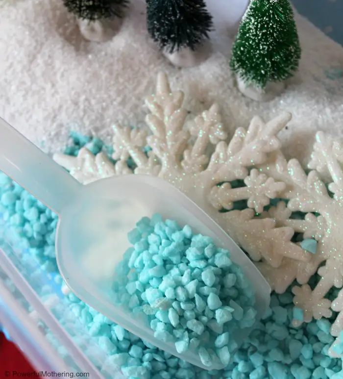 Shoveling-gravel-in-a-winter-sensory-bin