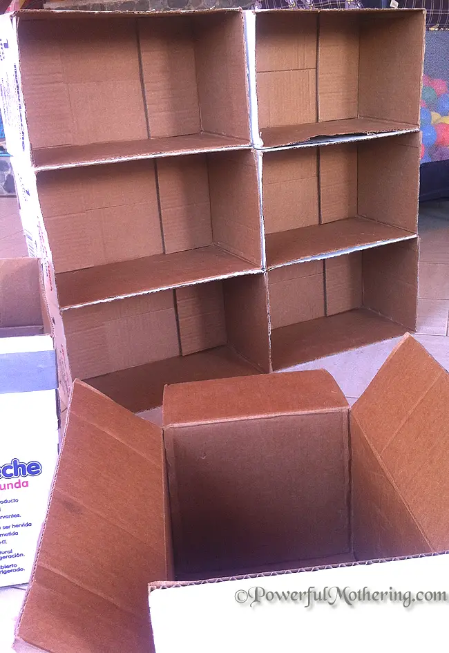 How-to-Make-A-Shelf-Out-Of-Cardboard-Boxes-Kids-Area-DIY-cutting-up